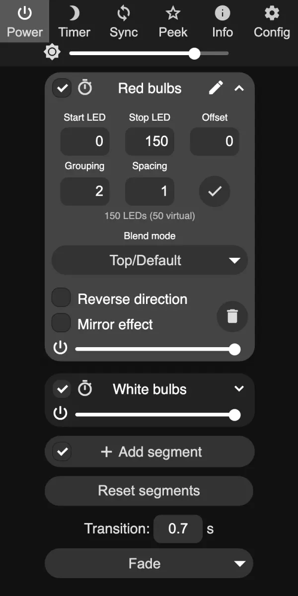 WLED web interface Segments tab with two segments, Red bulbs and White bulbs, the first expanded to show start, stop, grouping and spacing